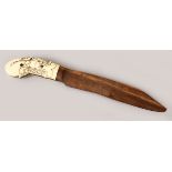 AN UNUSUAL 19TH CENTURY SRI LANKAN IVORY HILTED DAGGER / PAGE TURNER, with a wooden blade, the ivory