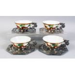 A SET OF FOUR 20TH CENTURY CHINESE FAMILLE ROSE PORCELAIN AND SILVER MOUNTED CUPS & SAUCERS, the