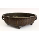 A GOOD 18TH / 19TH CENTURY CHINESE BRONZE CENSER, with carved decoration to the side in panels, with