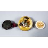 THREE GOOD JAPANESE MEIJI PERIOD CARVED IVORY & WOOD AND METAL MANJU NETSUKES, The first a carved