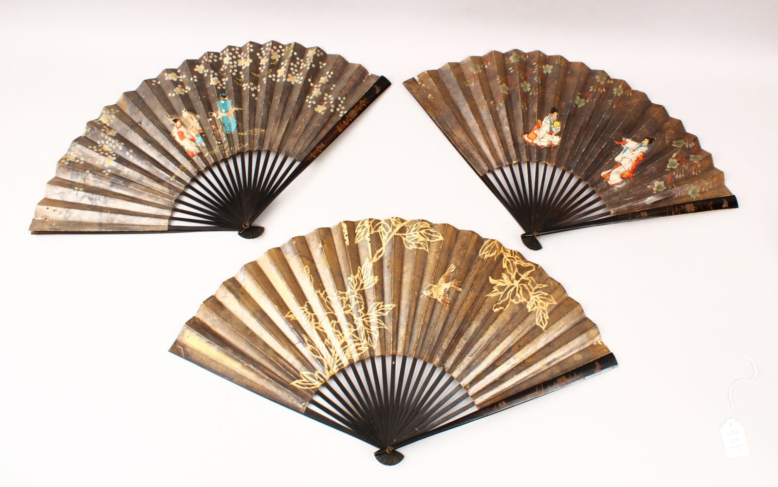 THREE JAPANESE MEIJI PERIOD LACQUER & PAINTED PAPER FANS, each painted to depict figures amongst - Image 2 of 13