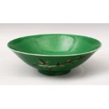 A GOOD CHINESE KANGXI PERIOD GREEN GROUND FAMILLE VERTE PORCELAIN BOWL, decorated with stylized