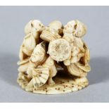 A GOOD JAPANESE MEIJI PERIOD CARVED IVORY NETSUKE OF MUSICIANS, the trio together, each playing an