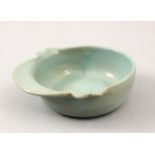 A GOOD CHINESE SONG STYLE RU WARE CRACKLE GLAZED MOULDED DISH, the base with an impressed mark, 12cm