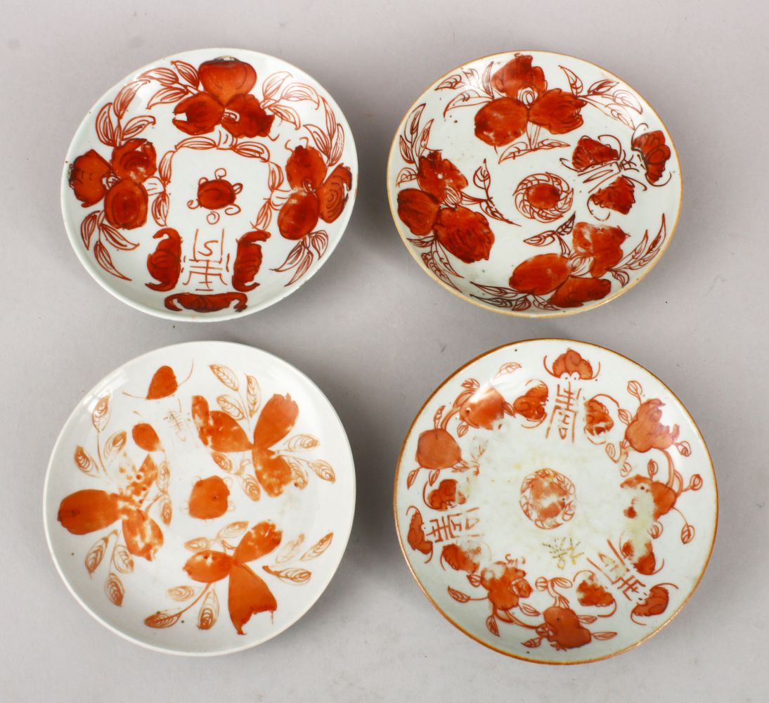 FOUR 19TH CENTURUY CHINESE IRON RED PORCELAIN PLATES, decorate with flora, fruits, bats and symbols,