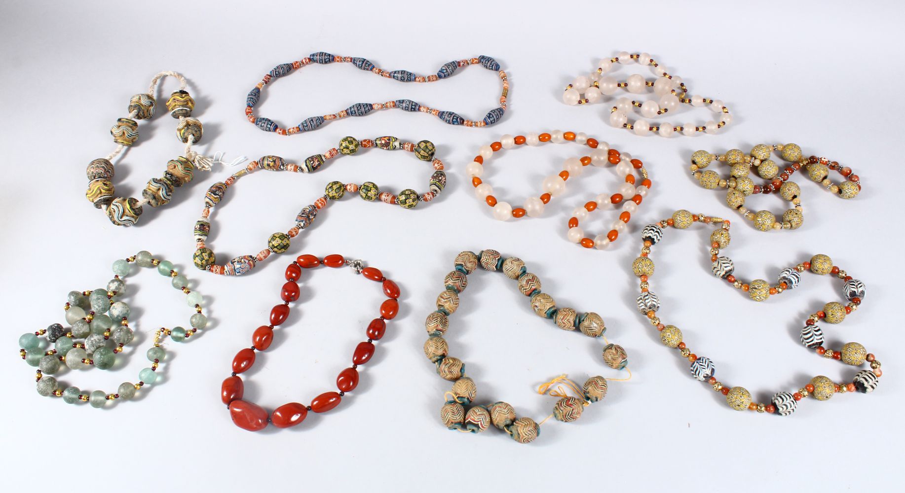 A MIXED LOT OF TEN EASTERN CERAMIC MOSAIC & CRYSTAL / GLASS BEAD NECKLACES, Various styles and - Image 2 of 27