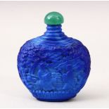 A GOOD 19TH / 20TH CENTURY CHINESE BLUE GLASS / HARDSTONE SNUFF BOTTLE, carved with scenes of