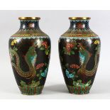 A PAIR OF 20TH CENTURY CHINESE CLOISONNE VASES, both decorated with scenes of phoenix birds