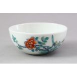 A CHINESE DOUCAI PORCELAIN CUP, the body decorated with scenes of flora, the base with a six