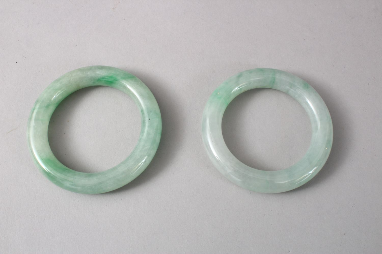 TWO GOOD CHINESE CARVED JADE BANGLES, 8cm diameter with an internal measurement of 5cm. - Image 5 of 5