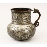 A GOOD 19TH CENTURY TURKISH / PERSIAN TIMURID TINNED COPPER EMBOSSED JUG, decorated with floral