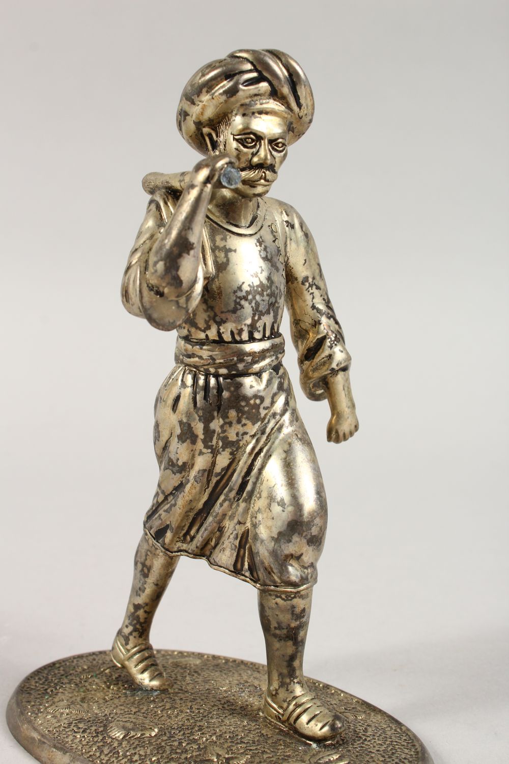 A GOOD INDIAN / ISLAMIC WHITE METAL FIGURE OF A MAN, the man upon a stylized shell base with an - Image 6 of 19