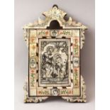 AN 18TH CENTURY PALESTINIAN BETHLEHEM ENGRAVED AND POLY-CHROMED MOTHER OF PEARL AND OLIVE WOOD ICON,