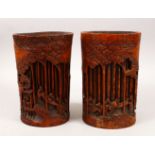 A GOOD PAIR OF 19TH CENTURY CHINESE BAMBOO BRUSH POTS, each decorated in relief to depict working