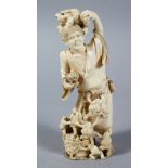 A GOOD JAPANESE MEIJI PERIOD CARVED IVORY OKIMONO OF GAMMA SENNIN & TOAD, the sennin stood in a