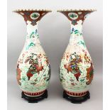 A LARGE PAIR OF JAPANESE MEIJI PERIOD FLARED TOP PORCELAIN KUTANI WARRIOR VASES, each of the vases
