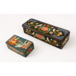 TWO PERSIAN HAND PAINTED BLACK LACQUER BOXES, the larger painted with birds and flowers, the smaller