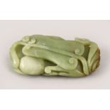 A GOOD QUALITY CHINESE CARVED JAXDE PEBBLE OF LINGXI, the carved fruit realistically rendered, 8cm