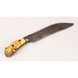AN 18TH CENTURY SRI LANKAN HILTED PHIA KEATA DAGGER, with carved and metal mounted hilt, 32cm long.