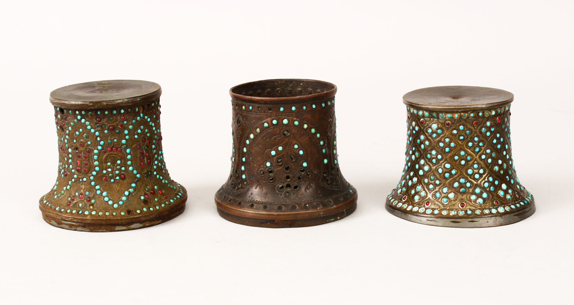 THREE 19TH PERSIAN QAJAR ISLAMIC HUQQA TOPS, all inlaid with turquoise beads, two with garnets, 7.