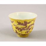 A CHINESE YELLOW / BISCUIT GROUND PORCELAIN DRAGON CUP, the base with a six character seal mark, 6cm