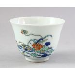A GOOD CHINESE DOUCAI PORCELAIN BOWL, decorated with scenes of ducks at pond side with flora, the