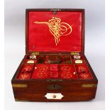 A GOOD ISLAMIC TURKISH BOXED BRASS BOUND CALLIGRAPHY SET WITH INLAID GOLD TOOLS, the brass bound box