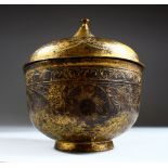 AN 18TH CENTURY TURKISH OTTOMAN GILDED COPPER 'TOMBAK' LIDDED BOWL, engraved with stylised foliage