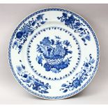 AN 18TH CENTURY CHINESE BLUE & WHITE PORCELAIN DISH, decorated with scenes of native floral