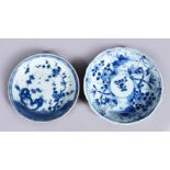 TWO 18TH CENTURY CHINESE BLUE & WHITE PORCELAIN SAUCERS, both with cafe au lait verso, both