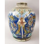 A GOOD 19TH CENTURY OR EARLIER PERSIAN QAJAR POTTERY VASE, decorated with formal scenes of flora