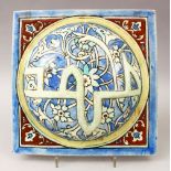 A GOOD IZNIK STYLE PORCELAIN TILE, decorated with scrolling foliage and raised calligraphy which