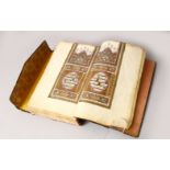 A VERY GOOD TURKISH OTTOMAN LEATHER BOUND BOOK OF QURAN, the pages finely decorated with gilt