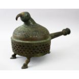 A 12TH / 13TH CENTURY LARGE PERSIAN SELJUK KHORASAN BRONZE INCENSE BURNER, with a bird shaped head