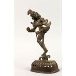 A GOOD 19TH CENTURY OR EARLIER INDIAN BRONZE MULTI ARM DEITY, stood upon lotus form base, holding
