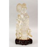 A VERY GOOD 19TH CENTURY CHINESE CARVED ROCK CRYSTAL FIGURE OF GUANYIN, she is stood holding a set