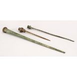 THREE CIRCA 600 BC LURISTAN BRONZE PINS, largest 29.5cm,