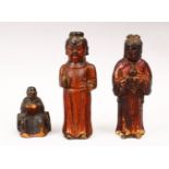 THREE 19TH CENTURY OR EARLIER CHINESE CARVED WOODEN FIGURES, each with polychrome decoration,16 &
