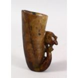 A GOOD CHINESE CARVED JADE / HARDSTONE LIBATION CUP, carved with a mythical bird head moulded