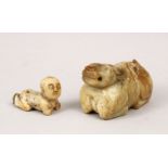 TWO CHINESE CARVED NEPHRITE CARVINGS OF A RECUMBENT OXEN AND BOY, 7cm & 4.3cm.