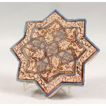 A GOOD ISLAMIC STAR / OCTAGONAL SHAPE CALLIGRAPHIC LUSTRE TILE, decorated with a continuous band