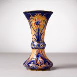 A GOOD SMALL MOORCROFT POTTERY MACINTYRE VASE. Circa. 1900. Printed MacIntyre, Burslem mark. 5ins