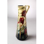 A MOORCROFT POTTERY TALL JUG. Signed Sian Leeper, for MDS, 2000. 9.5ins high.