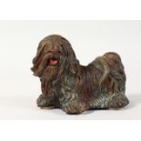 A HEAVY CAST BRONZE PEKINGESE. 5ins high.