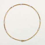 AN 18CT YELLOW GOLD AND DIAMOND NECKLACE.
