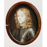 A LATER OVAL MINIATURE OF LORD DANBY 1685, wearing armour. Inscribed on reverse. 8cms x 6cms.