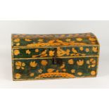A 19TH CENTURY DOME TOP PINE TRUNK/MARRIAGE CHEST, painted with birds and flowers. 25.5ins wide.