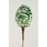 A PIERCED JADE HAIRPIN.