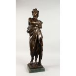A GOOD CLASSICAL BRONZE OF A STANDING ROMAN, on a square marble base. 27ins high.