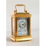 A MINIATURE MULTI DIAL CARRIAGE CLOCK, with Sevres panels. 3ins.